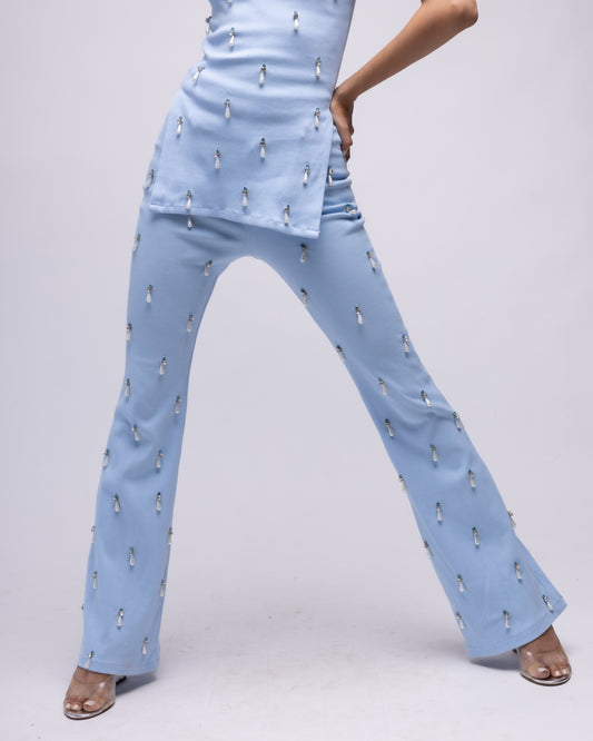 Ribbed trousers with embellishments
