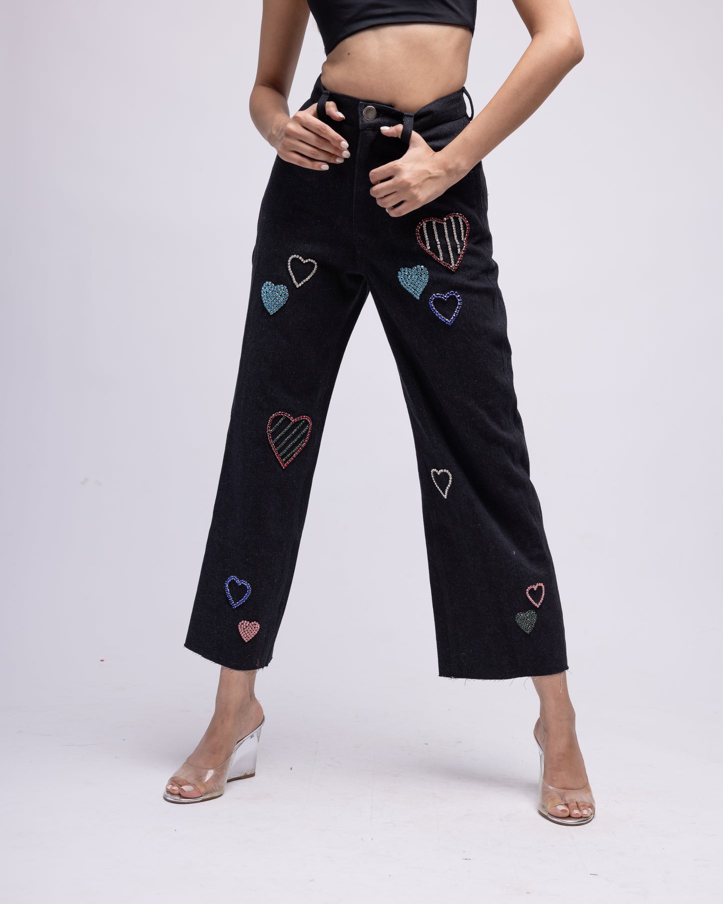 High-waisted jeans with multi-colour embellished hearts