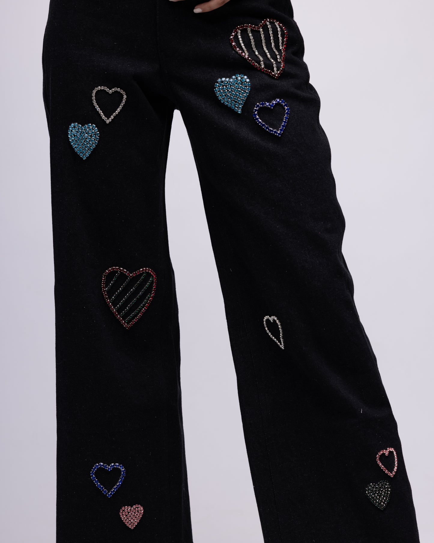 High-waisted jeans with multi-colour embellished hearts