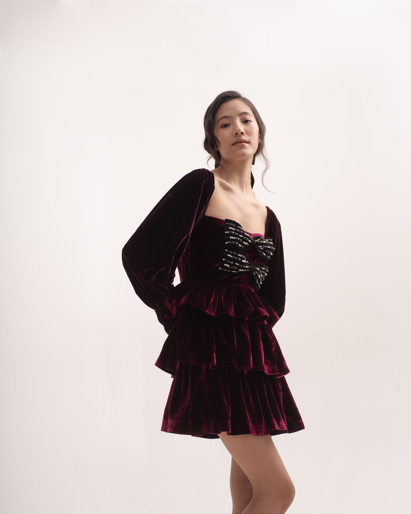 Silk-velvet ruffled mini dress with embellished bows