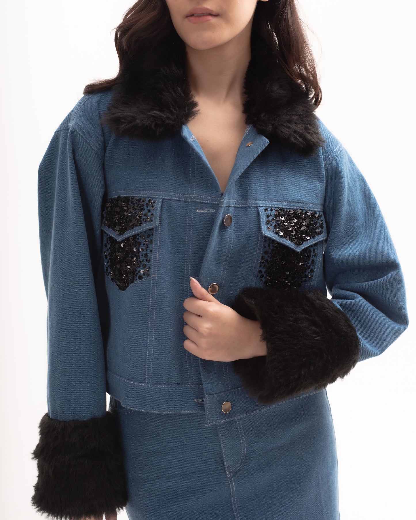 Denim faux fur jacket with sequin pockets