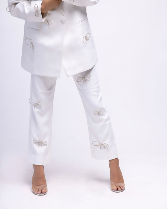 High-waisted ankle length trousers with rhinestone bows LIMITED EDITION