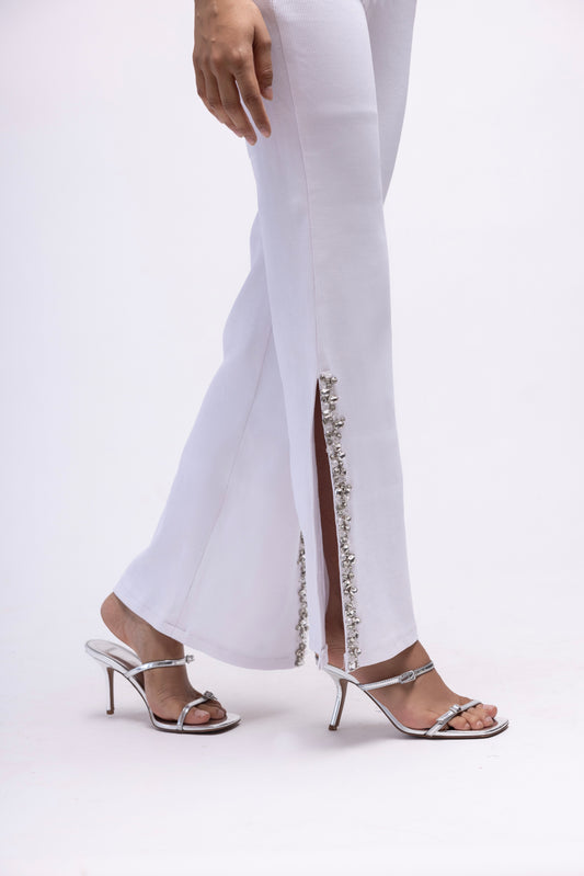 Ribbed side slit trousers with embellishments